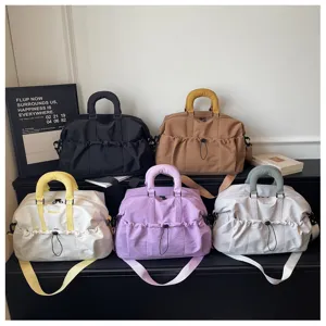 Gran bolsa de viaje deportiva para mujer, bolso de gimnasio ligero de varios colores.