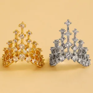 Detailed view of gold and silver castle architecture open rings with sparkling rhinestones