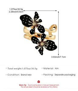 Details zum Armreif mit schwarz-weißen Polka-Dot-Blumen inkl. Maße und Gewicht