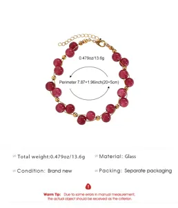 Red glass beaded bracelet with gold spacers and specification details