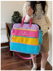Bunte Dopamin Farblock Reisetasche Detail, grosse Kapazitaet Segeltuch Wochenendtasche Tasche.