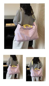 Large capacity travel duffel bag for women and men, lightweight overnight gym sports luggage bag.