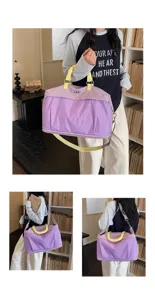 Grande borsa da viaggio viola con manici gialli, bagaglio leggero per brevi viaggi e palestra.