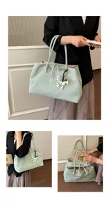 Sage green tote bag detail view, spacious shoulder bag featuring cute dalmatian charm.