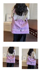 Detailed view of the large capacity purple travel and gym bag showing its spacious design.