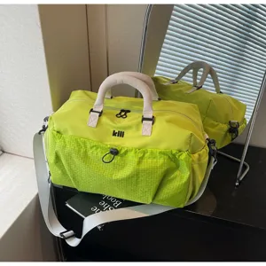 Large capacity travel duffel bag for women and men, waterproof gym sports bag for weekend trips.