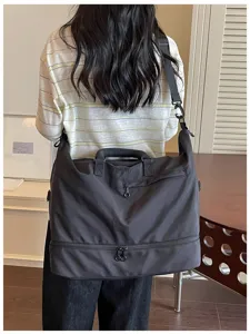 Large capacity travel duffel bag with bottom compartment and shoulder strap for fitness
