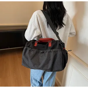 Large capacity travel duffel bag for women and men, gym sports bag with checkered pocket.