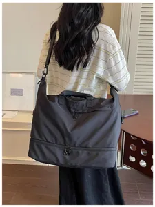 Large capacity travel duffel bag for women and men, ideal for gym, sports, and weekend trips.