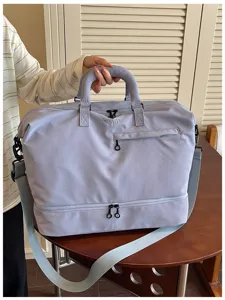 Large capacity purple travel duffel bag detail view, perfect for gym, sports and short trips.