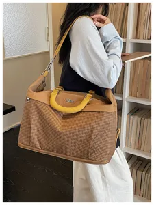 Grande capacita borsa da viaggio con manici gialli e design con motivo a quadri elegante per tutti