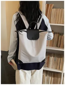 Zaino da lavoro leggero con manico e patta perfetto per viaggi, scuola e tempo libero.