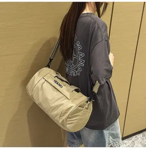 Khaki cylindrical gym duffel bag large capacity sports travel shoulder bag for men and women