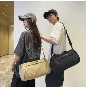 Large capacity sports gym duffel bag for men and women, casual travel outdoor shoulder bag.