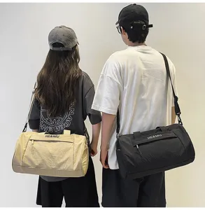 Large capacity sports fitness duffel bag travel gym shoulder bag for men and women.