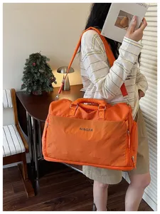 Grand sac de voyage fourre-tout orange portable courte distance bagage pour fitness femme