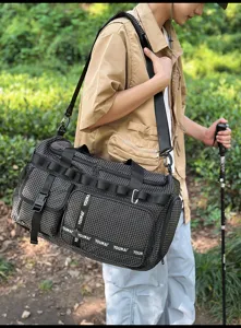 Large capacity black checkered travel duffel bag, casual sports shoulder bag for outdoor use.