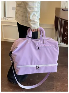 Large capacity travel duffel bag, casual gym bag with shoulder strap, purple weekend bag for women.