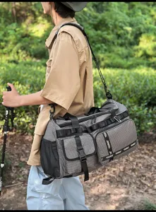 Large capacity travel duffel bag with grid pattern, multi-pocket sports gym bag for outdoor use.