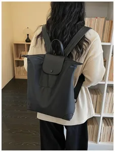 Zaino casual nero per commuter vista dettagliata, borsa da viaggio leggera per studenti.