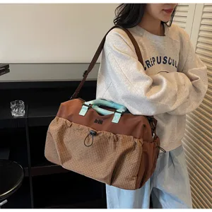 Large capacity travel duffel bag for women and men, gym sports luggage bag for weekend.