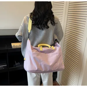 Large capacity travel duffel bag detail, perfect for short trips, gym, and luggage storage.