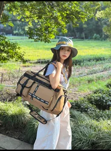 Large capacity travel duffel bag with multi-pockets and shoulder strap for outdoor sports.