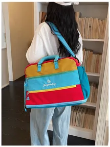 Bunte Dopamin Reisetasche mit großem Fassungsvermögen, Schultergurt und stilvollem Farbdruck.