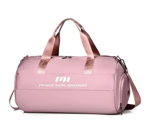 Pink sports duffel bag detail, wet dry separation gym bag for women and men travel fitness.