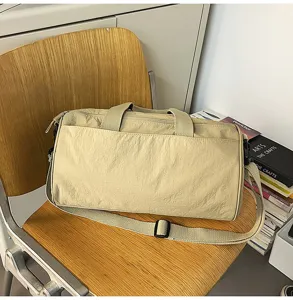 Casual canvas travel duffel bag with adjustable shoulder strap and large capacity for gym sports