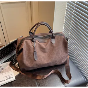 Elegante borsa da viaggio marrone borsone con tracolla per brevi viaggi capiente e pratica.