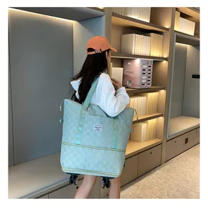 Gran bolsa de viaje con ruedas, práctico bolso de lona plegable con trolley para mujeres.