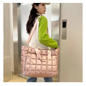 Stylish quilted puffer travel tote bag for women, ideal for yoga, fitness and weekend trips.