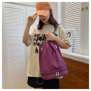 Waterproof dry wet separation gym backpack for women and men, stylish portable travel bag.