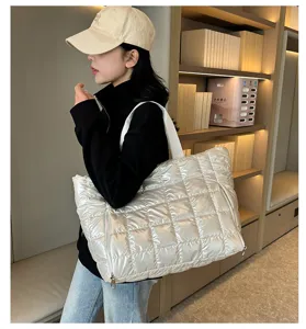 Stylish silver quilted tote bag for women, large capacity shoulder puffer travel handbag.