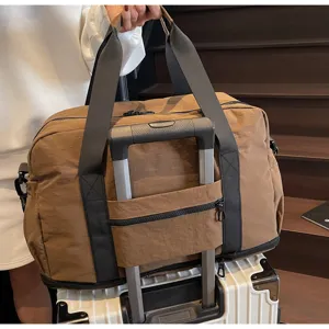 Große Reistasche mit Kofferaufstecktasche, leichte braune Wochenendtasche für Damen.