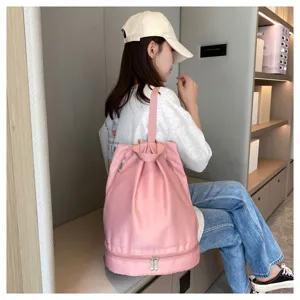 Pink waterproof gym backpack with dry wet separation, stylish casual daypack for daily travel.
