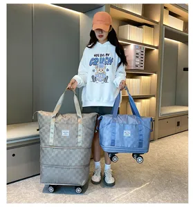 Gran bolsa de viaje con ruedas, bolso de viaje extensible con ruedas universales para mujeres.