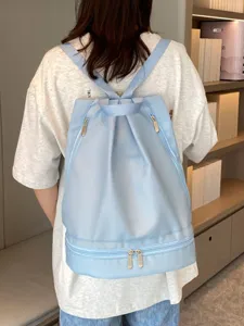 Waterproof minimalist backpack with dry wet separation pocket for swimming gym sport travel use.