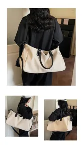 Grande borsa da viaggio duffel per donna e uomo, elegante borsa weekender minimalista.