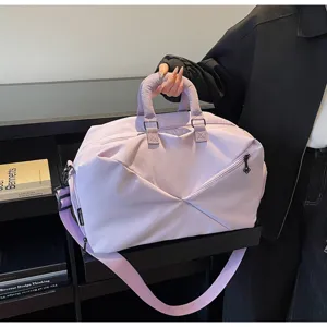 Light purple large capacity travel gym duffel bag with shoulder strap and comfortable carry handle.