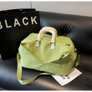 Large capacity travel duffle bag for women and men, gym sports bag with shoulder strap.