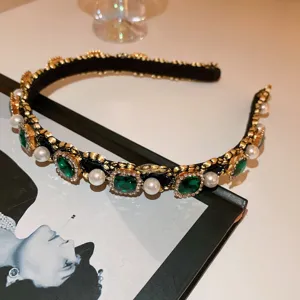 Detail view of luxury pearl rhinestone headband, French court style vintage black gold hair hoop.