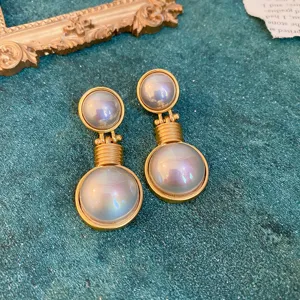Vintage palace style gold earrings with iridescent pearl cabochons elegant jewelry