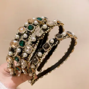 Detailed view of luxury vintage pearl and crystal jeweled headbands, French court hair accessory
