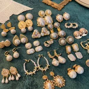 Vintage pearl earrings collection, French palace style metal and baroque pearl chic jewelry.