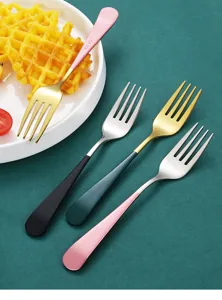 Stainless steel fork detail view, modern colored handle cutlery set for daily use.