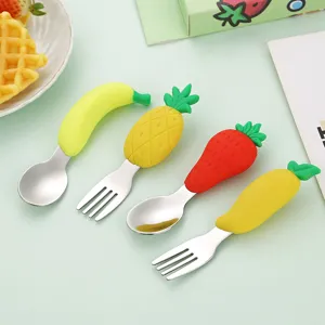 Roestvrijstalen baby lepel en vork set met schattige cartoon fruit siliconen handvatten.