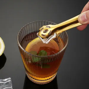 Pinza per ghiaccio dorata in acciaio inox, design a griffe creativo per bar e drink.