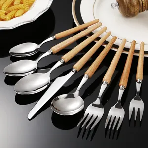 Edelstahl Besteck Set mit Holzgriff und Kuechen Geschirr Messer Gabel Löffel Set.